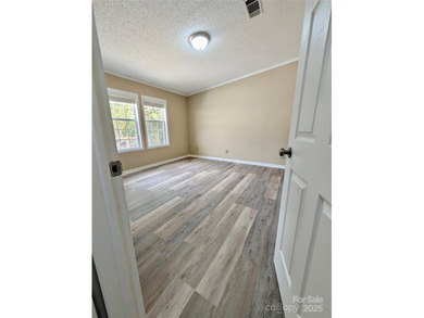 Looking for a little extra space? This inviting 3BR/2BA home in - photo 5