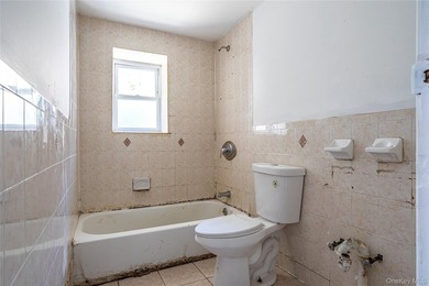 Colonial-style home featuring 4 bedrooms, 1.5 baths, formal - photo 11