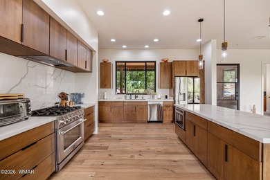 A modern masterpiece in the heart of Payson, this custom-built - photo 16