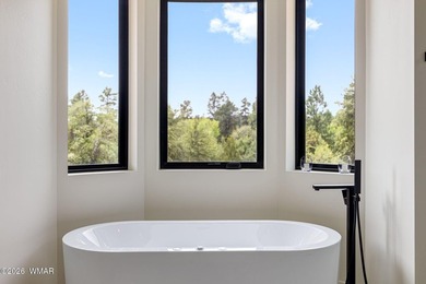 A modern masterpiece in the heart of Payson, this custom-built - photo 23