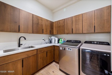 A modern masterpiece in the heart of Payson, this custom-built - photo 28