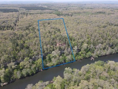Discover 9.5 acres +/- of scenic recreational timberland with - photo 1