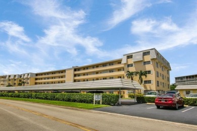 Lake Condo For Sale in Atlantis, Florida