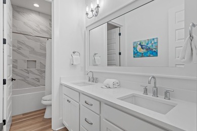 Welcome to the exceptional coastal retreat located in the highly - photo 26