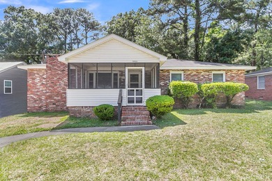 Situated on a spacious lot at 5433 Pennsylvania Avenue, this - photo 1