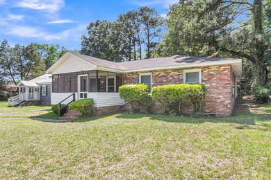 Situated on a spacious lot at 5433 Pennsylvania Avenue, this - photo 2