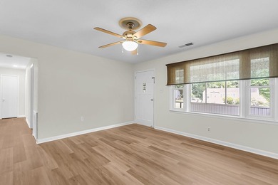 Situated on a spacious lot at 5433 Pennsylvania Avenue, this - photo 5