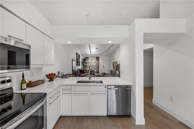 West of US 41 Under $400k. Rarely available, top-floor residence