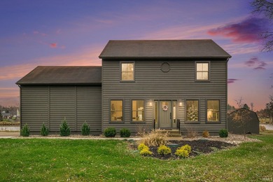 **PRICE IMPROVEMENT** Welcome to your dream home nestled on the - photo 1