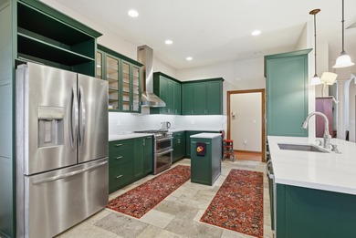 Stunning Custom Home in Rivercut Golf Course. One of the largest