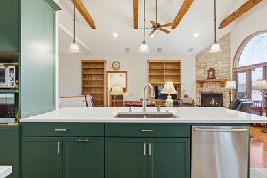 Stunning Custom Home in Rivercut Golf Course. One of the largest