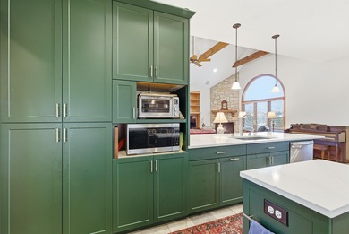 Stunning Custom Home in Rivercut Golf Course. One of the largest