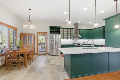 Stunning Custom Home in Rivercut Golf Course. One of the largest