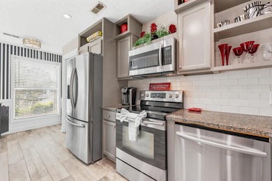 Welcome to this beautiful 3-bedroom, 2.5-bath condominium in the - photo 6