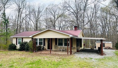 Escape to your own sanctuary just minutes from Buzzard Rock - Lake Home For Sale in Kuttawa, Kentucky