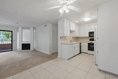 Welcome to this beautifully maintained top-floor corner unit in - photo 2
