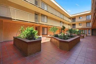 Welcome to this beautifully maintained top-floor corner unit in - photo 6