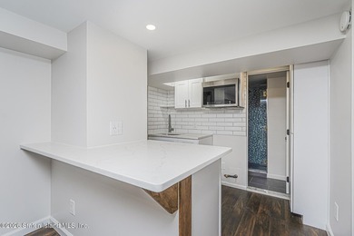 Welcome to 25 Morgan Lane, a charming brick home located in the - photo 22