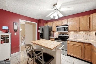 Nestled in the serene community of Apple Mt Lake, this charming - photo 3