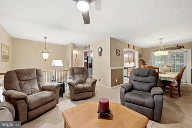 Nestled in the serene community of Apple Mt Lake, this charming - photo 8
