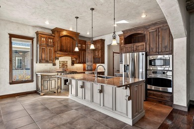 THE VIEW! COMPARE TO NEW CUSTOM BUILDS! An inviting and warm