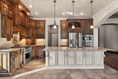 THE VIEW! COMPARE TO NEW CUSTOM BUILDS! An inviting and warm