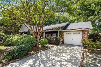 This charming brick home sits in a cul-de-sac on a quiet street - photo 2