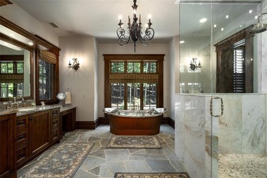 Spectacular, European ski chalet with a truly grand entry into - photo 14