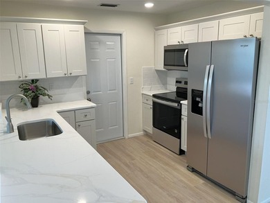 Welcome to this beautifully updated home located in the - photo 7