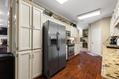 This well-maintained brick home offers a spacious and great - photo 4