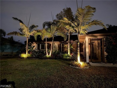 Discover your dream retreat in the heart of SW Cape Coral! This - photo 4