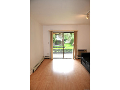 Welcome to Baybridge Condominiums, a prestigious 24-hour gated - photo 2