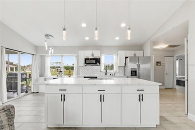 Virtually Staged. Welcome to 12123 Mallorca Ave, a beautifully - photo 3