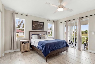 Virtually Staged. Welcome to 12123 Mallorca Ave, a beautifully - photo 5