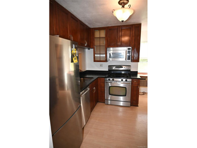 Welcome to Baybridge Condominiums, a prestigious 24-hour gated - photo 8