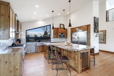 Dream mountain living awaits in this stunning modern home built - photo 8