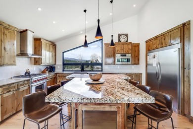 Dream mountain living awaits in this stunning modern home built - photo 9