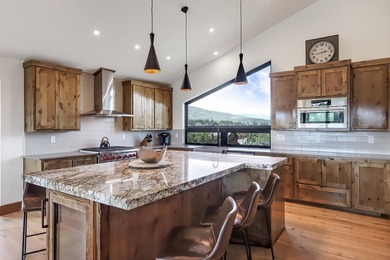 Dream mountain living awaits in this stunning modern home built - photo 10