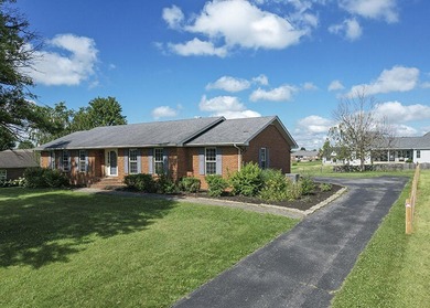 Move-in ready and full of space, this charming brick ranch in - photo 3