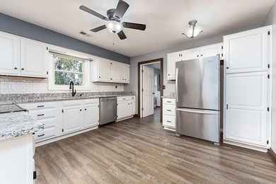 Move-in ready and full of space, this charming brick ranch in - photo 10