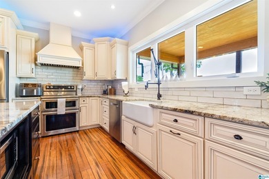 This all-brick, four-bedroom, four-and-a-half-bath home blends - photo 11