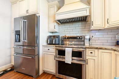 This all-brick, four-bedroom, four-and-a-half-bath home blends - photo 13