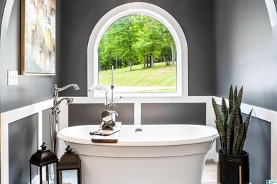 This all-brick, four-bedroom, four-and-a-half-bath home blends - photo 21