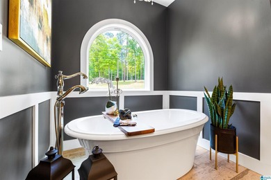 This all-brick, four-bedroom, four-and-a-half-bath home blends - photo 27