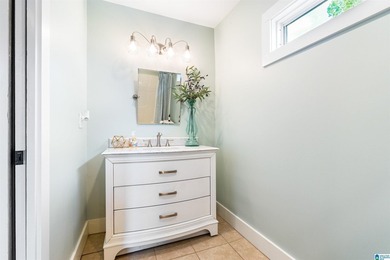 This all-brick, four-bedroom, four-and-a-half-bath home blends - photo 30
