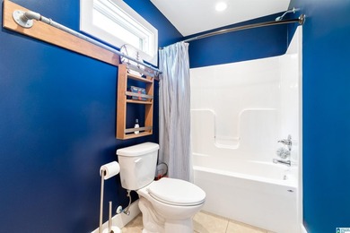This all-brick, four-bedroom, four-and-a-half-bath home blends - photo 35