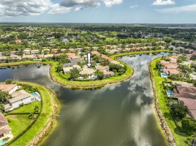 Lake Home For Sale in Palm Beach Gardens, Florida