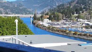 This furnished two-story condo near the Chetco River is move-in - photo 3