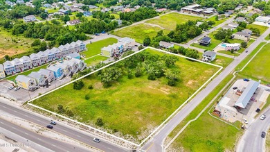 Unlock the potential of 3.9 acres of prime commercial land in - photo 4
