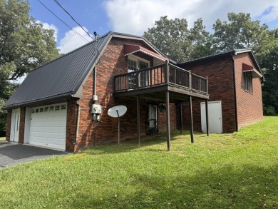 Beautiful brick home with four bedrooms, living room